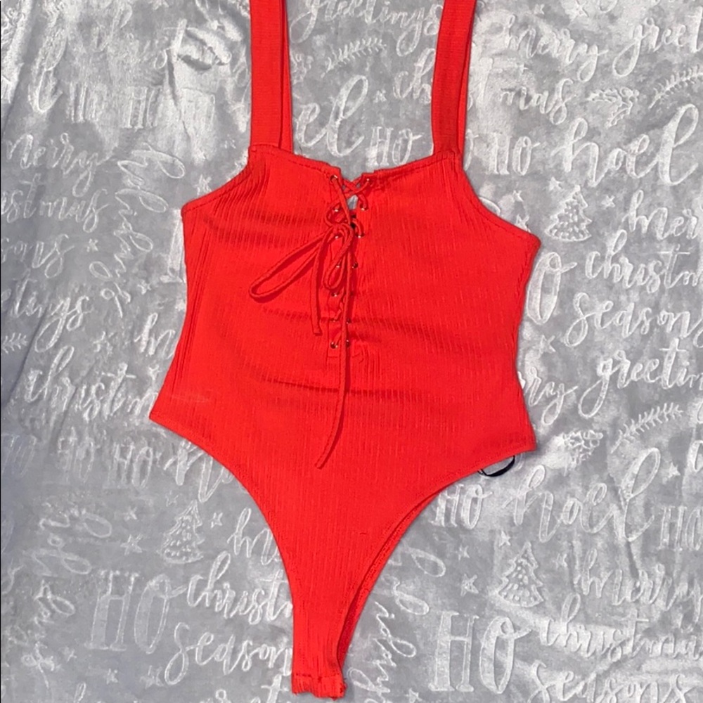 Body suit , Never been worn.